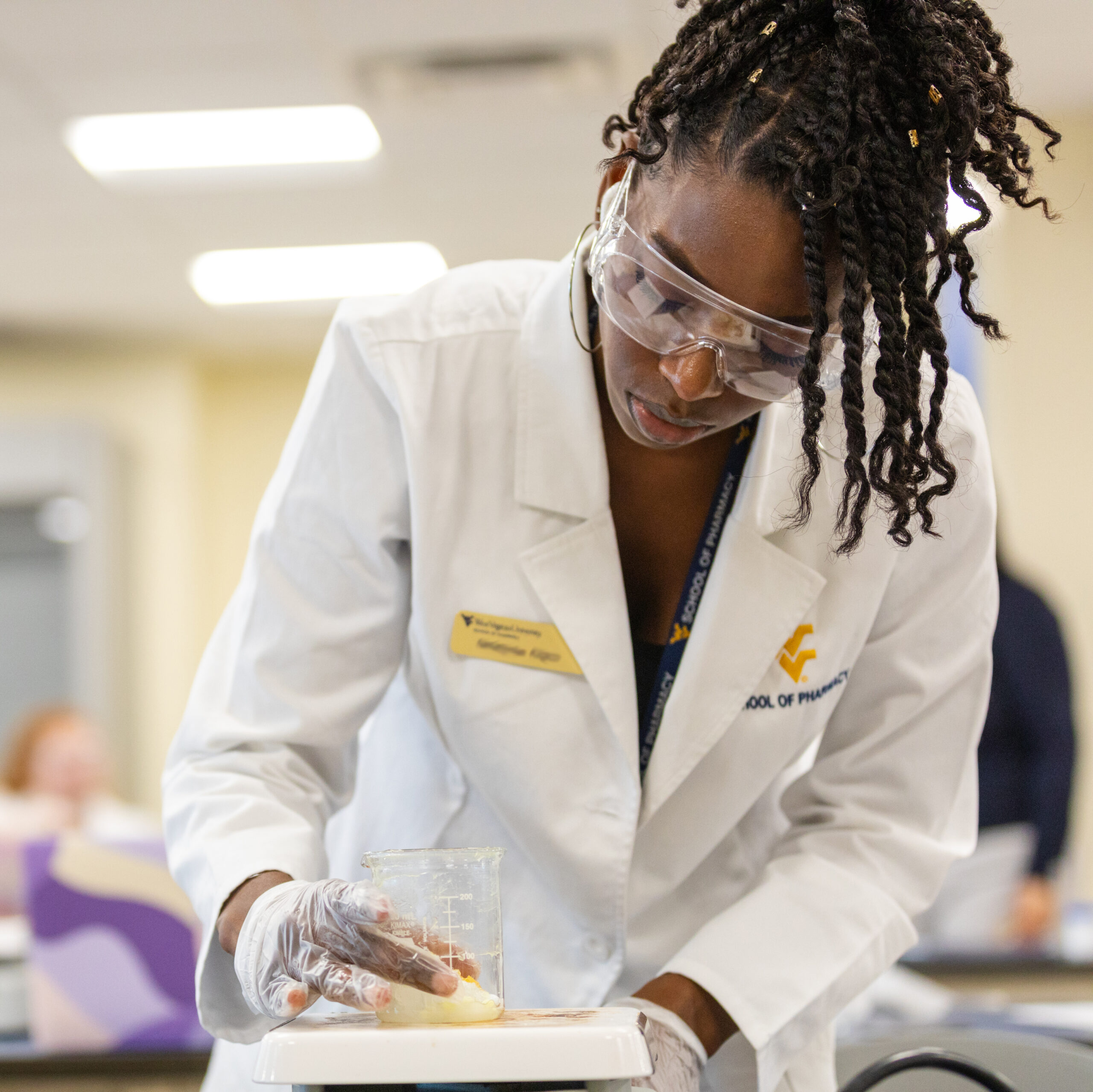 pharmacy student in a lab