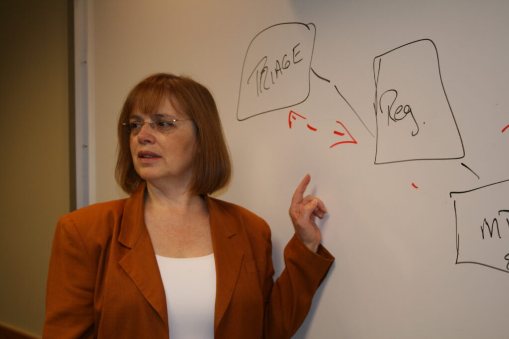 Dr. Sandra Schneider at the whiteboard